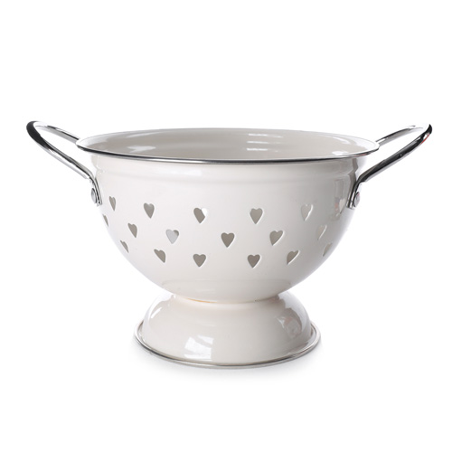 White enamel colander on white background
