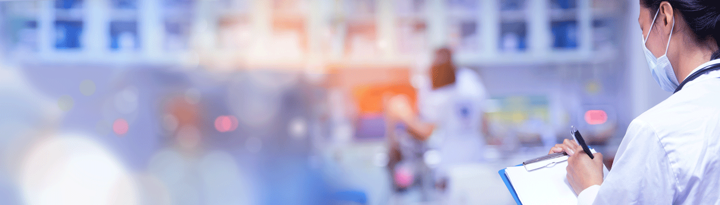 A health-care professional reporting on infection prevention and control lapses with the use of a pen and clipboard